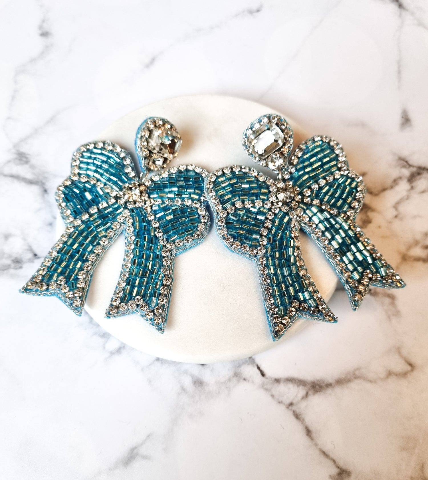 New York Chic Earrings- Bows Aq/Cry